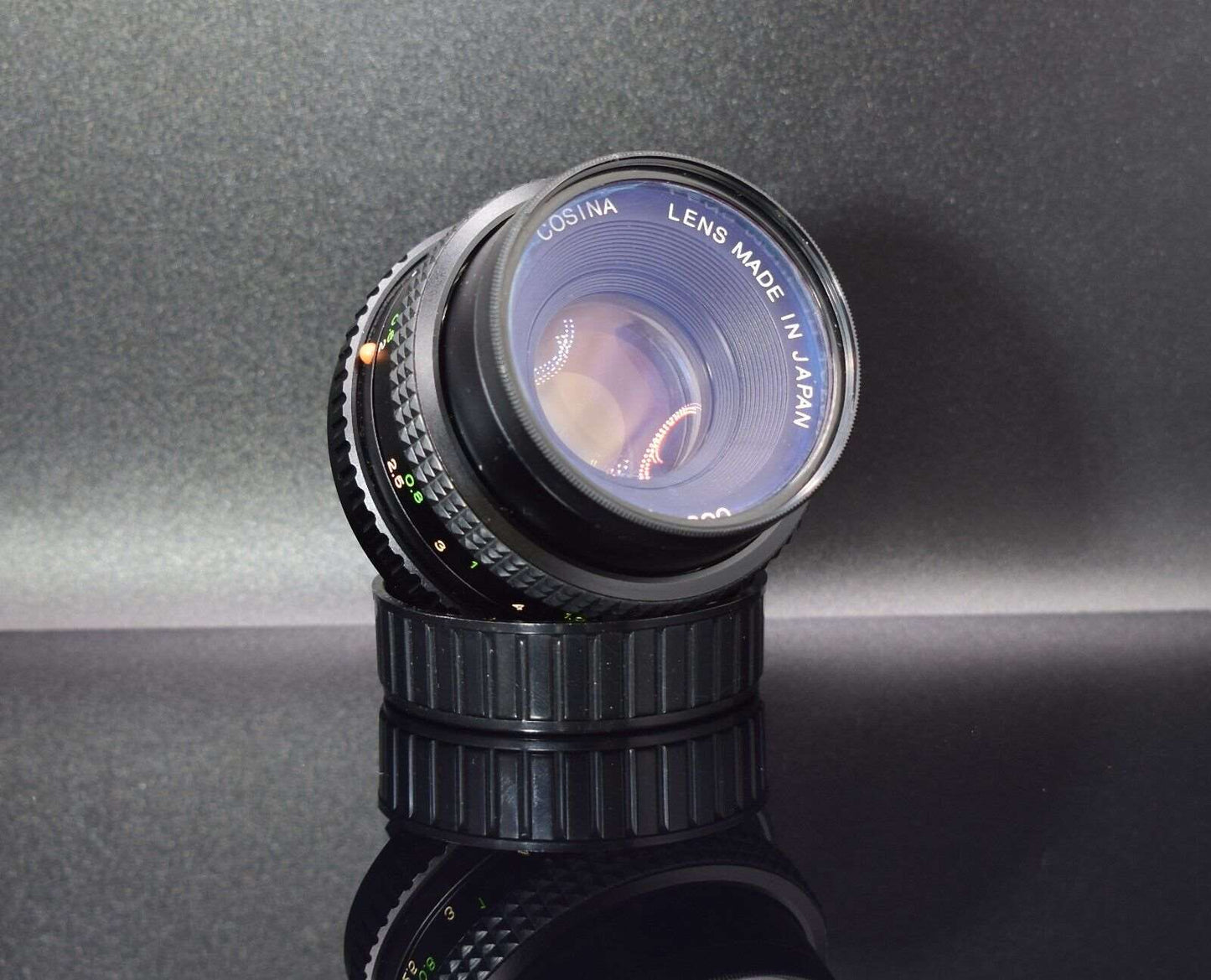 Cosina Cosinon S 50mm f/2 PK Mount Camera Lens with HOYA SKYLIGHT 1B Filter & Lens Caps