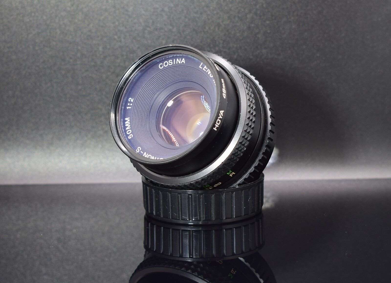 Cosina Cosinon S 50mm f/2 PK Mount Camera Lens with HOYA SKYLIGHT 1B Filter & Lens Caps