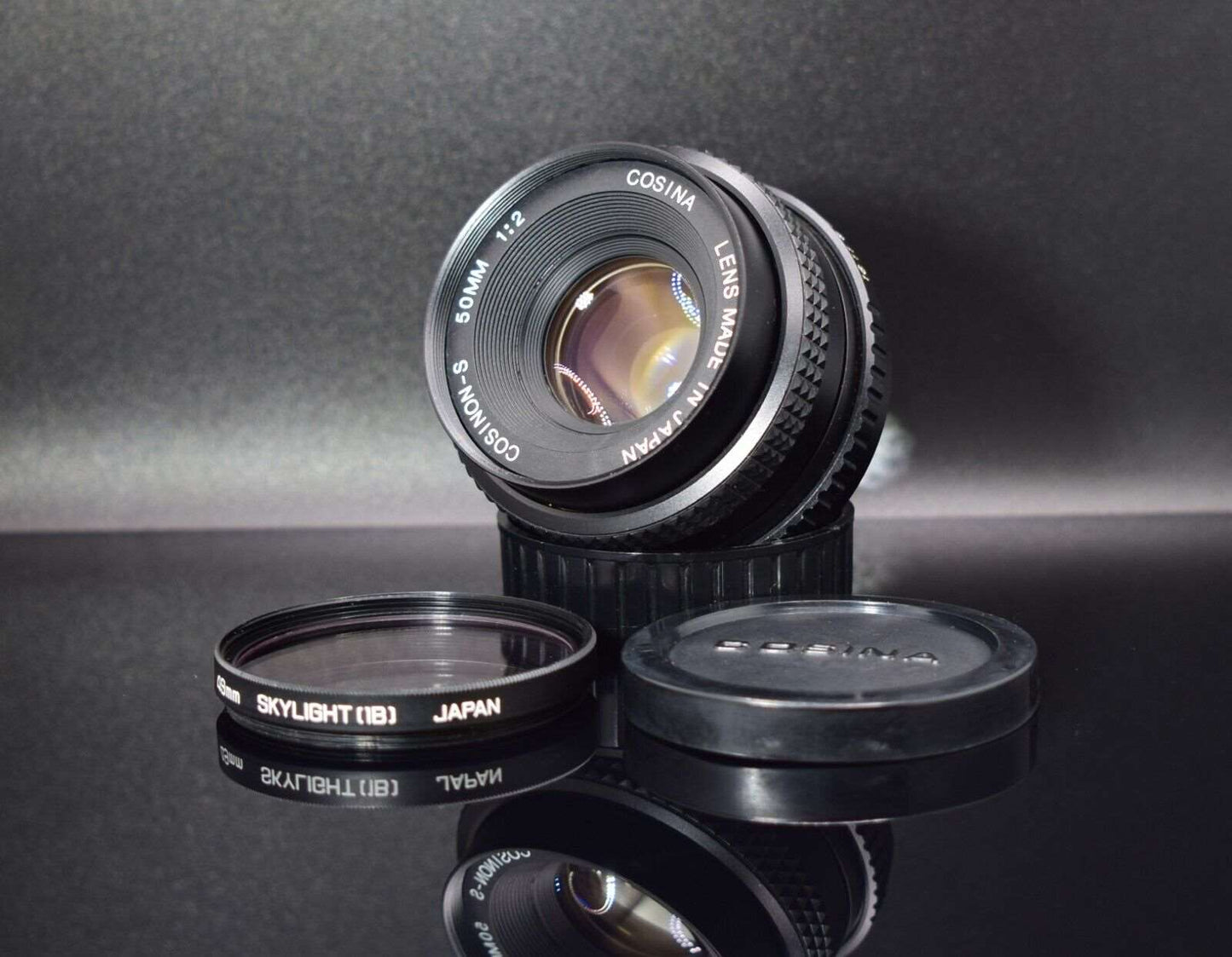 Cosina Cosinon S 50mm f/2 PK Mount Camera Lens with HOYA SKYLIGHT 1B Filter & Lens Caps