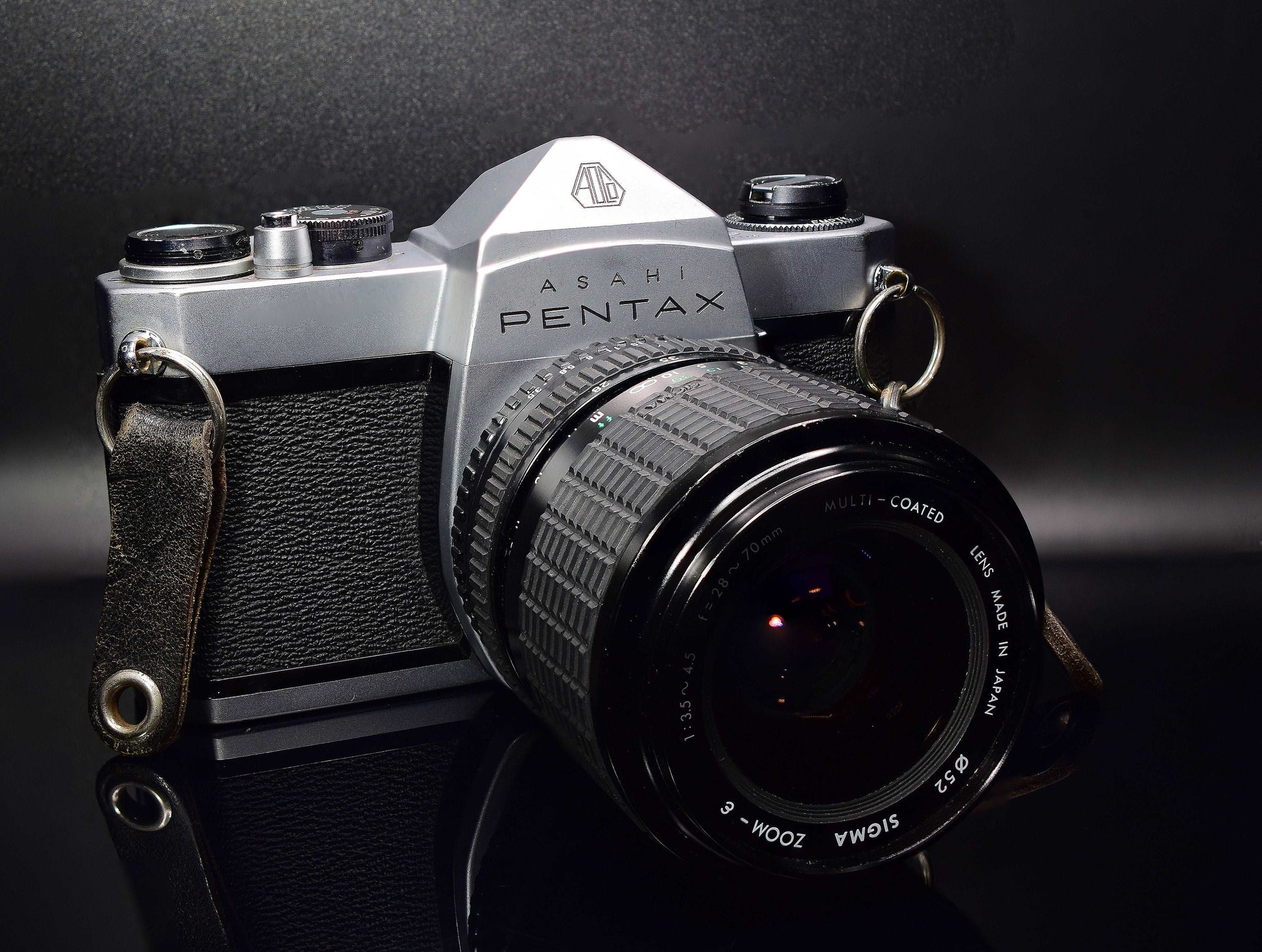 ASAHI Pentax SP1000 35mm Film SLR Camera with SIGMA f/3.5 28-70mm Zoom Lens and Detachable Cold Shoe Attachment